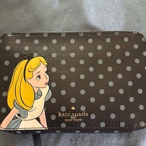 Kate Spade Blue Alice in Wonderland crossbody and ID card holder set. Like new.